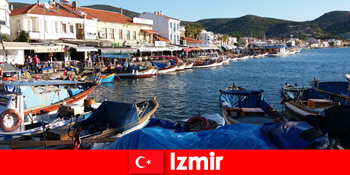 सक्रिय यात्रियों इज़मिर तुर्की में शहर और समुद्र तट के बीच लघुकरण