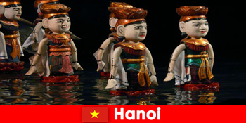 पानी कठपुतली थियेटर में प्रसिद्ध प्रदर्शन हनोई वियतनाम में अजनबियों को प्रेरित